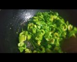 A picture of step 3 of Karela dopyaza.