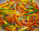A picture of step 4 of Keto Wors and Sweet Peppers.