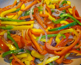 A picture of step 4 of Keto Wors and Sweet Peppers.