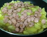 Foto del paso 7 de la receta Sartén de patatas, huevos y salchichas con queso mozarella