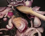 A picture of step 1 of Fluffy's sausage rolls with caramelised red onion.