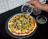 A picture of step 13 of Chicken Tikka Pizza.