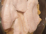 Merluza al horno con patatas panadera