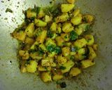A picture of step 5 of Suki bhaji (potato sabji).