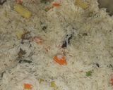 A picture of step 3 of Veg pulao with chicken gravy.