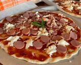 Foto del passaggio 5 della ricetta Pizza ad occhio di Assunta