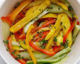 A picture of step 2 of Mango Bell peppers Cucumber Salad with Thyme Vinaigrette.