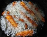 A picture of step 2 of Crispy honey chilli baby corn.