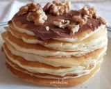 Foto del passaggio 10 della ricetta Pancake con nutella e noci