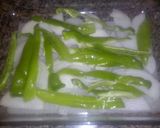 Foto del paso 2 de la receta Dorada al horno con cebolla y pimientos