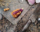 A picture of step 10 of Gutthi vankaya.