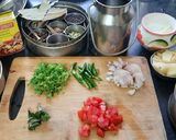 A picture of step 1 of Green peas and potato pulao.