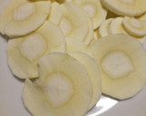 A picture of step 1 of Parsnip crisps with sea salt and thyme.