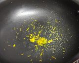 A picture of step 3 of Orange Bread balls.