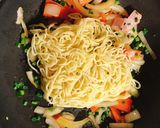 A picture of step 2 of Yakisoba with sunny side up egg.