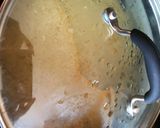 A picture of step 5 of Chicken Arroz Caldo.