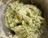 A picture of step 6 of Cheese and broccoli baked potatoes.