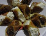 Foto del paso 7 de la receta: Pañuelitos de pionono con dulce de leche y crema chantilly