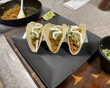 A picture of step 10 of Pineapple Salsa Pork Tacos.