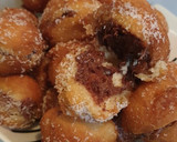 Foto del paso 6 de la receta: Buñuelos rellenos de crema de cacao y coco rallado