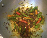 A picture of step 4 of Chilli and grapes Pickle.