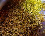A picture of step 2 of Green Gram (Moong Dal) & Asafoetida (Daliya).