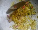 A picture of step 2 of Fried rice with green gram.