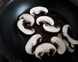 A picture of step 2 of Sig's Grilled avocado with fruity mushroom sauce.