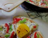 A picture of step 4 of Egg Pan Pizza#worldwideeggs.