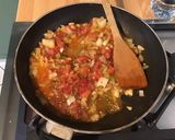 Une image de l'étape 8 de Tomates noires farcies à l élan,oignon et carotte,couronne de poireaux.
