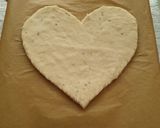 A picture of step 8 of Heart shaped Veg pizza.