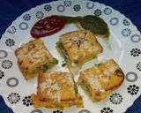 A picture of step 6 of Cheesy besan bread toast.