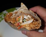 A picture of step 5 of Sweet twisted pulled chicken wrap.