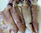 Foto del paso 3 de la receta Chipirones a la plancha rellenos de pasta de cilantro, ajos y jengibre