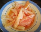 Foto del paso 4 de la receta: Bastoncillos de perca empanados con cebolla caramelizada