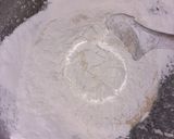 A picture of step 2 of Chocolate icing doughnuts.