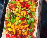 A picture of step 4 of Veggie Loaded pizza with homemade dough.