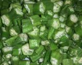 A picture of step 1 of Achari Tawa bhindi.