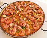Foto del paso 17 de la receta Paella mixta de conejo y marisco en barbacoa