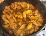 Une image de l'étape 11 de Pommes de terre à la tomate, coriandre et épices.
