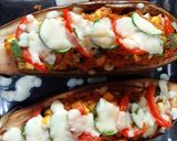 A picture of step 7 of Soya Brinjal Bharta Stuffed Eggplant Boat in Soyabean curry.
