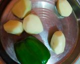 A picture of step 1 of Potatoes And capsicum veg.