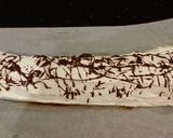 A picture of step 28 of Chocolate Strawberry Ice Cream Cake Roll.