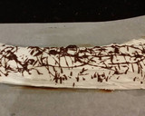 A picture of step 28 of Chocolate Strawberry Ice Cream Cake Roll.
