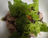 A picture of step 1 of Riceberry Rice Porridge with Chicken Thigh.