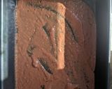 A picture of step 4 of Enchiladas with black bean mole.