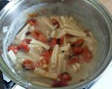 A picture of step 8 of Vickys Creamy Garlic Pasta with Roasted Tomatoes GF DF EF SF NF.