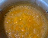 A picture of step 11 of Sweet and sour Tomato Curry serve with white rice.