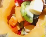 A picture of step 4 of Musk melon mixed fruit dessert.