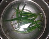 A picture of step 1 of Fried Green Chilies.
